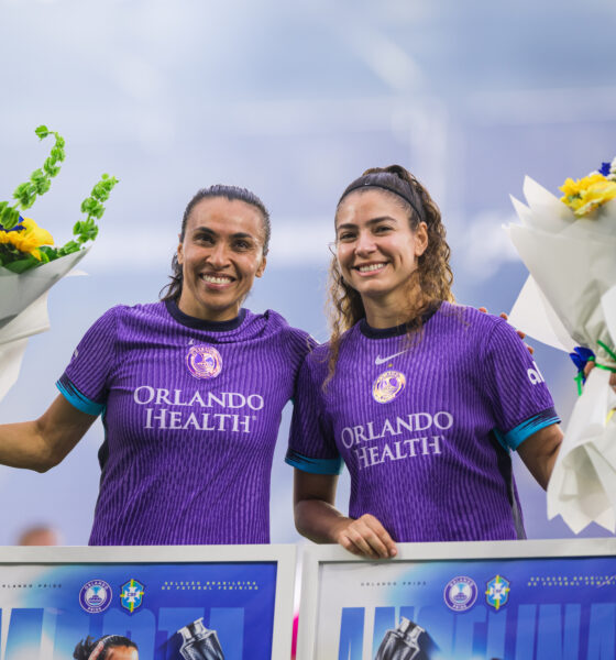 Image of Marta and Angelina being honored before a game.
