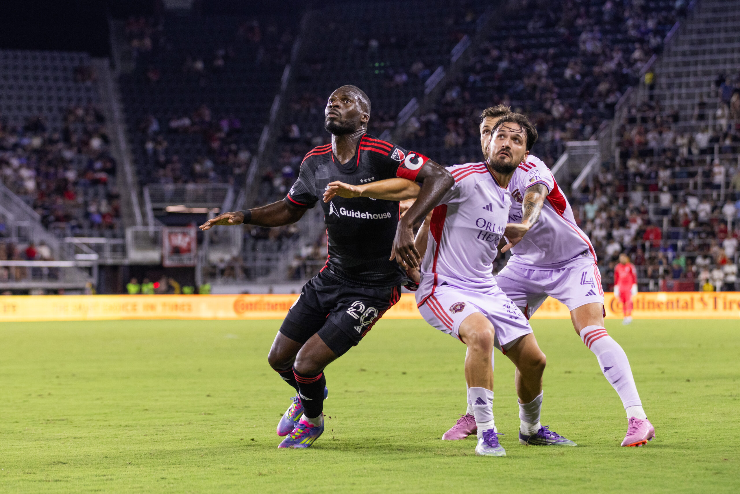 Image of Joran Gerbet trying to hold off Christian Benteke.