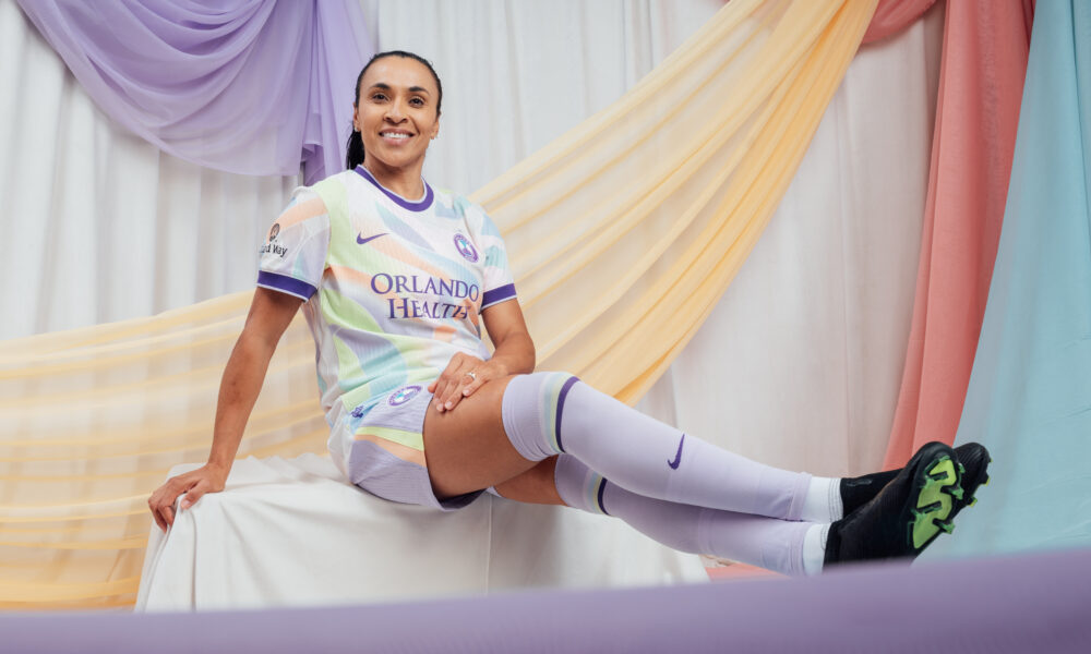 Image of Marta showing off the Pride's new Unity Kit.