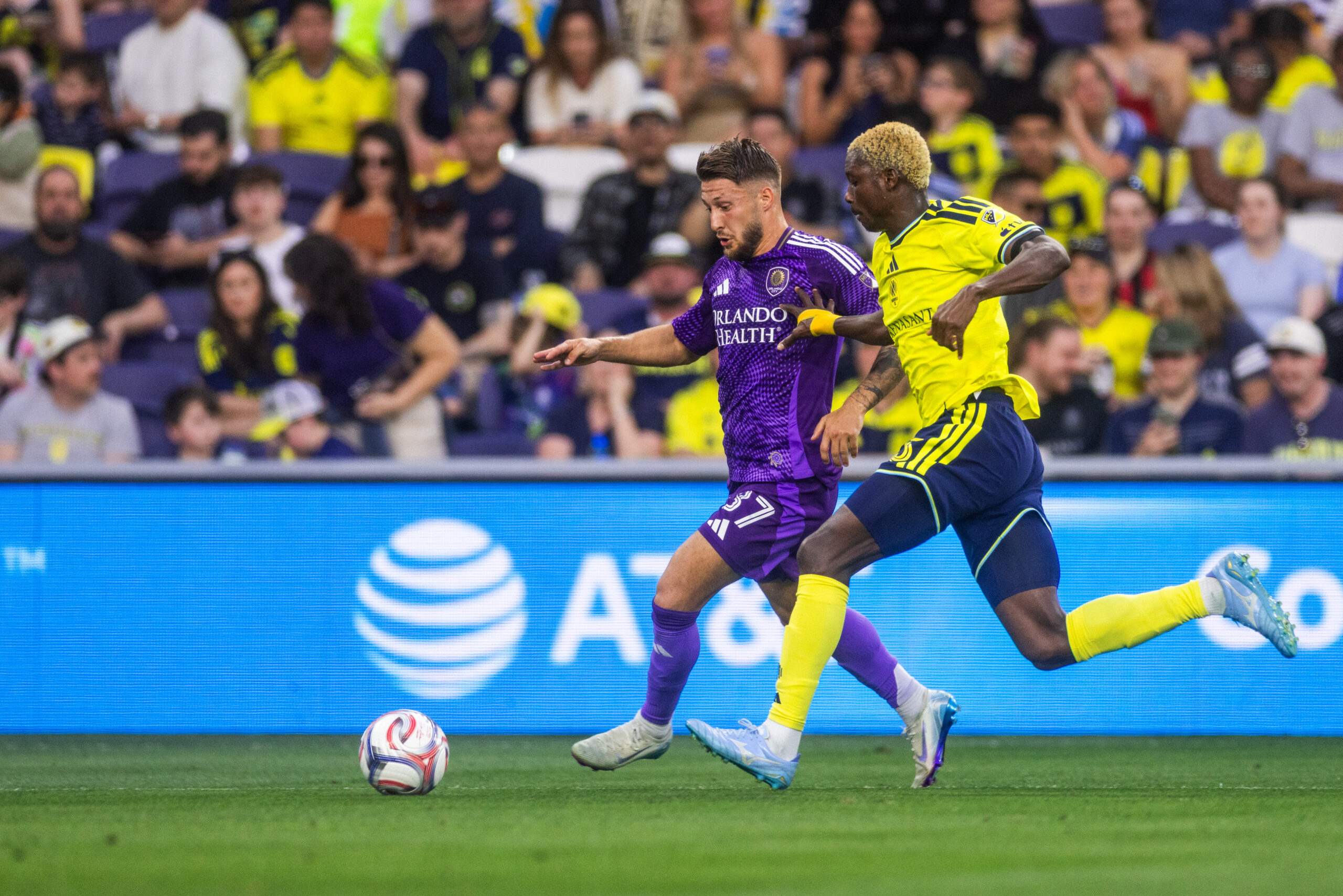 Image of Marco Pasalic dribbling up the field against Nashville.