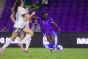 Image of Barbra Banda taking a shot against Seattle.