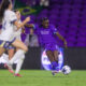 Image of Barbra Banda taking a shot against Seattle.