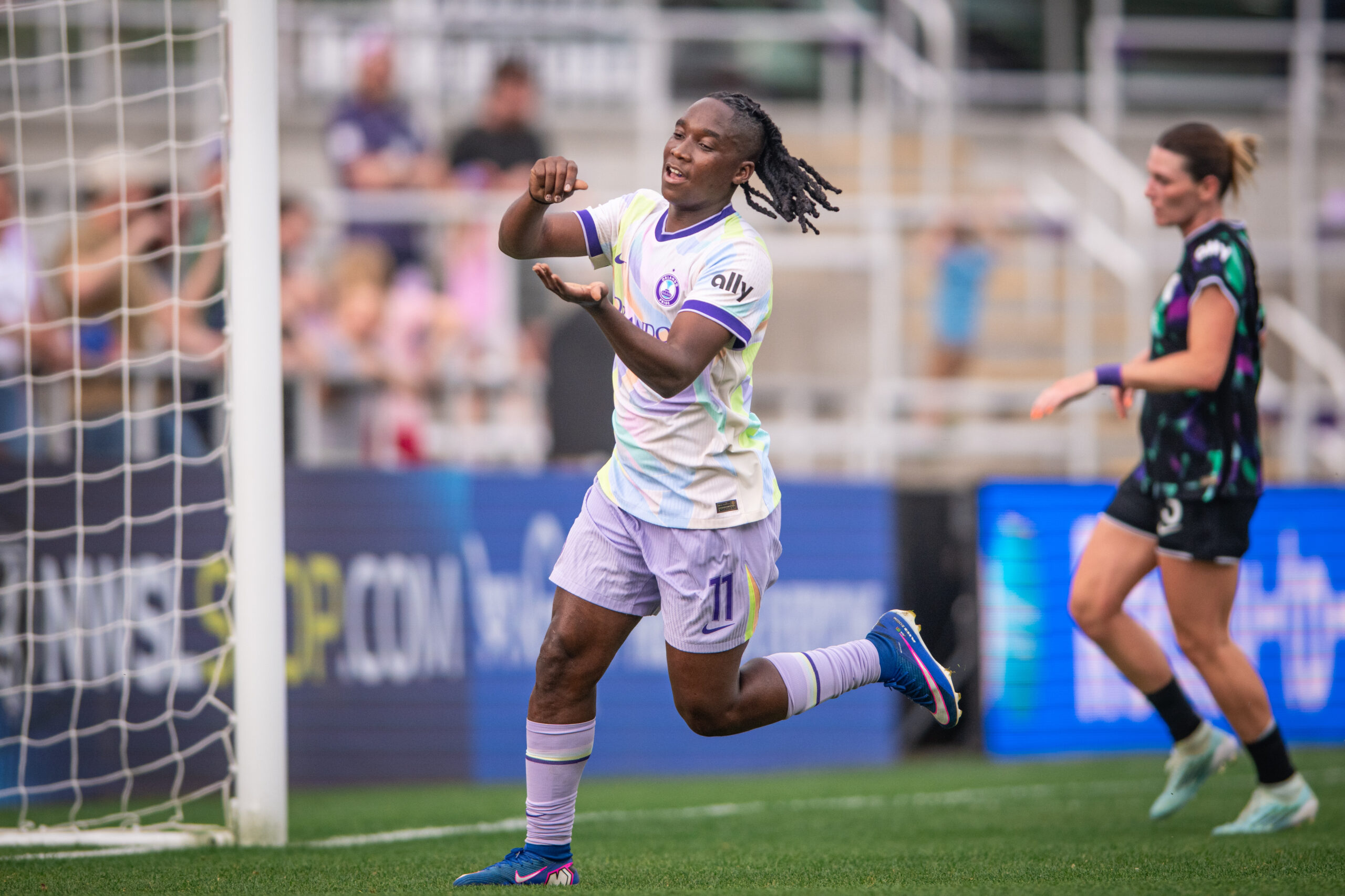Image of Barbra Banda celebrating a goal against Louisville.