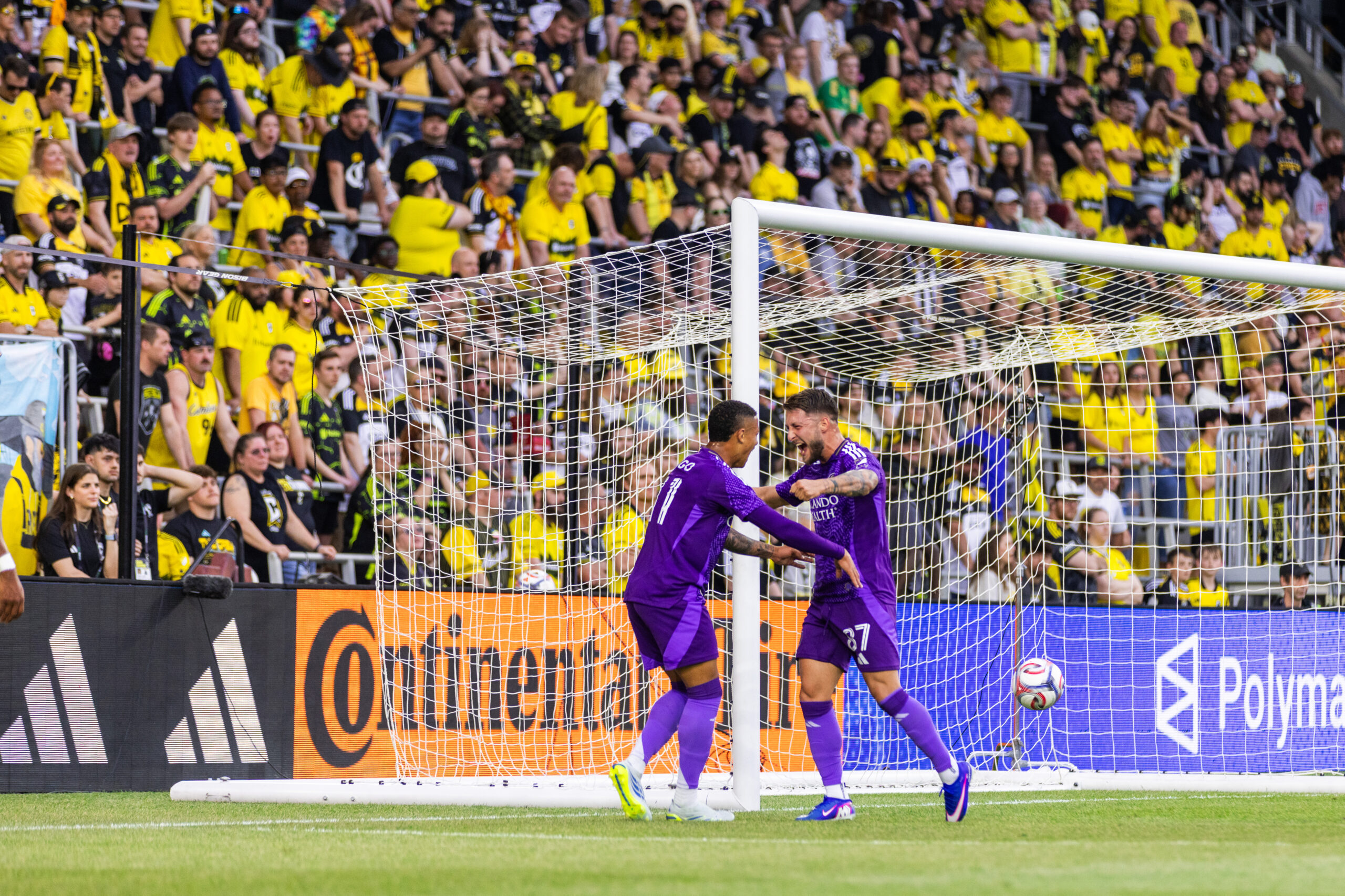 Image of Tiago and Marco Pasalic celebrating a goal in Columbus.