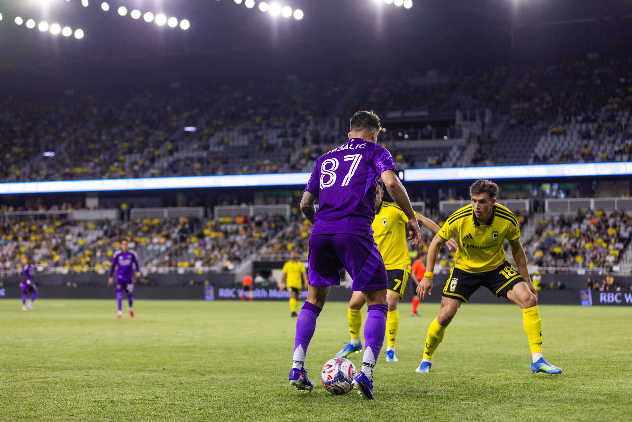 Image of Marco Pasalic trying to create space to shoot against Columbus.