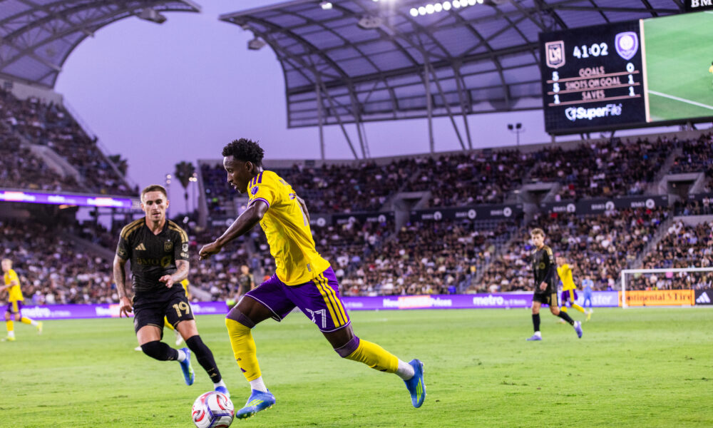 Image of Ivan Angulo trying to dribble past an LAFC defender.