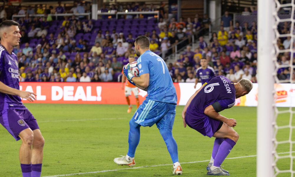 Image of Maxime Crepeau catching the ball in front of goal.
