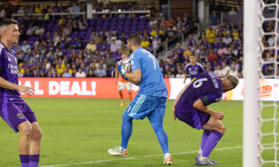 Image of Maxime Crepeau catching the ball in front of goal.