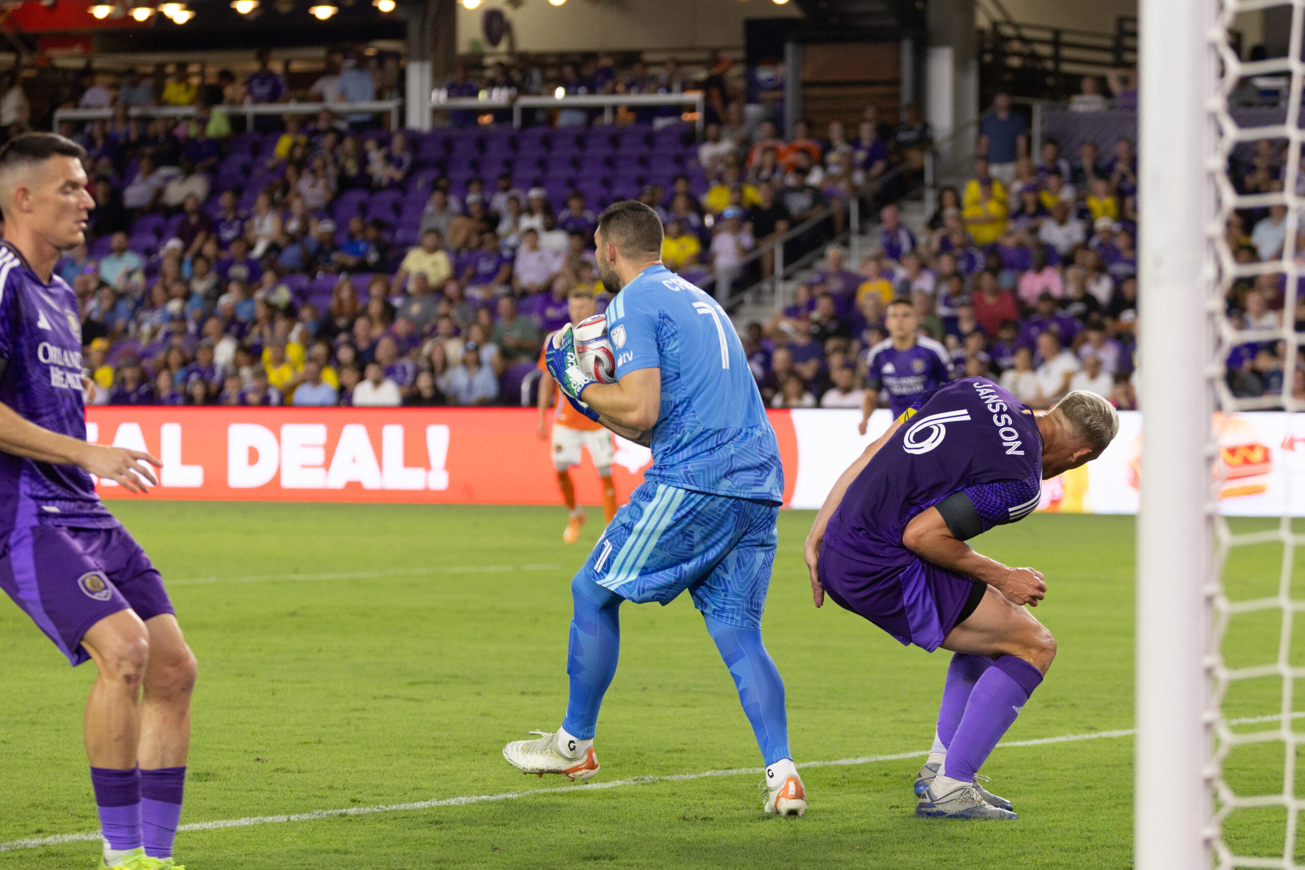 Image of Maxime Crepeau catching the ball in front of goal.