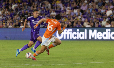 Image of Braian Ojeda trying to dribble past a Houston defender.