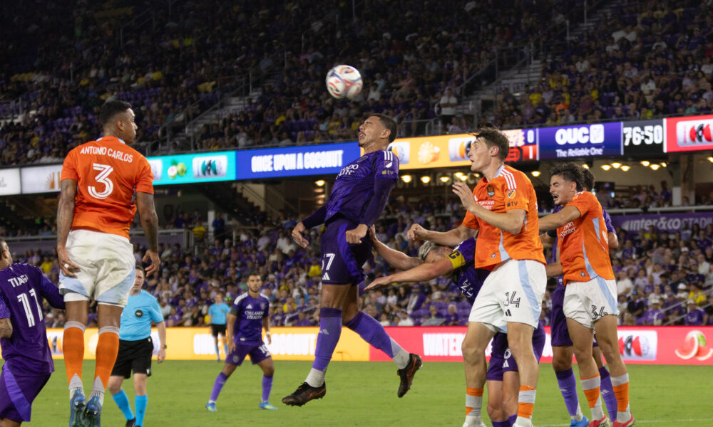 Image of Iago heading the ball against Houston.