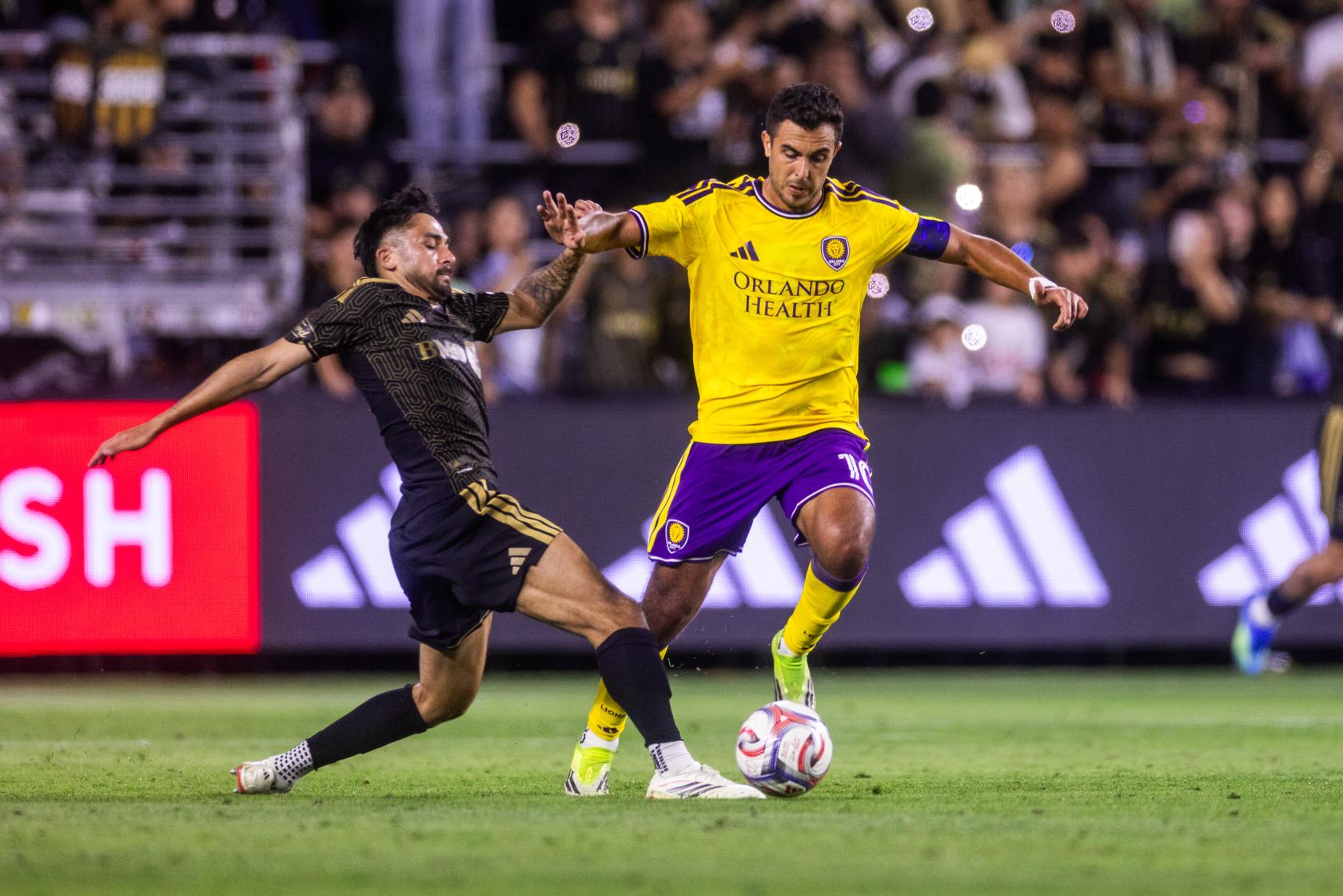 Image of Martin Ojeda fighting for the ball against LAFC.