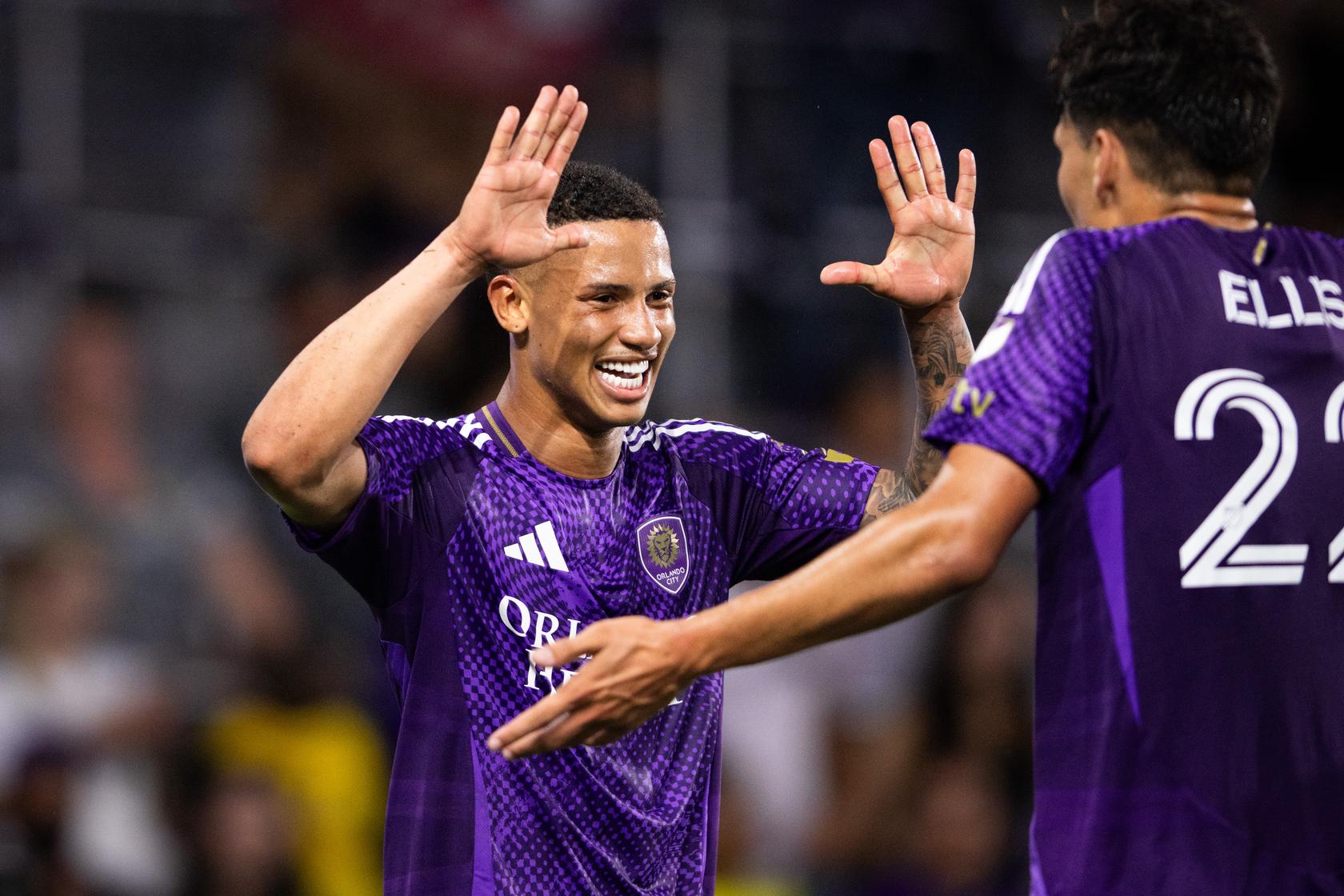 Image of Tiago celebrating a goal with Justin Ellis against Atlanta.