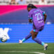 Image of Nicole Payne taking a shot against San Diego.