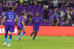 Image of Barbra Banda celebrating her winning goal against the Courage.