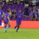 Image of Barbra Banda celebrating her winning goal against the Courage.