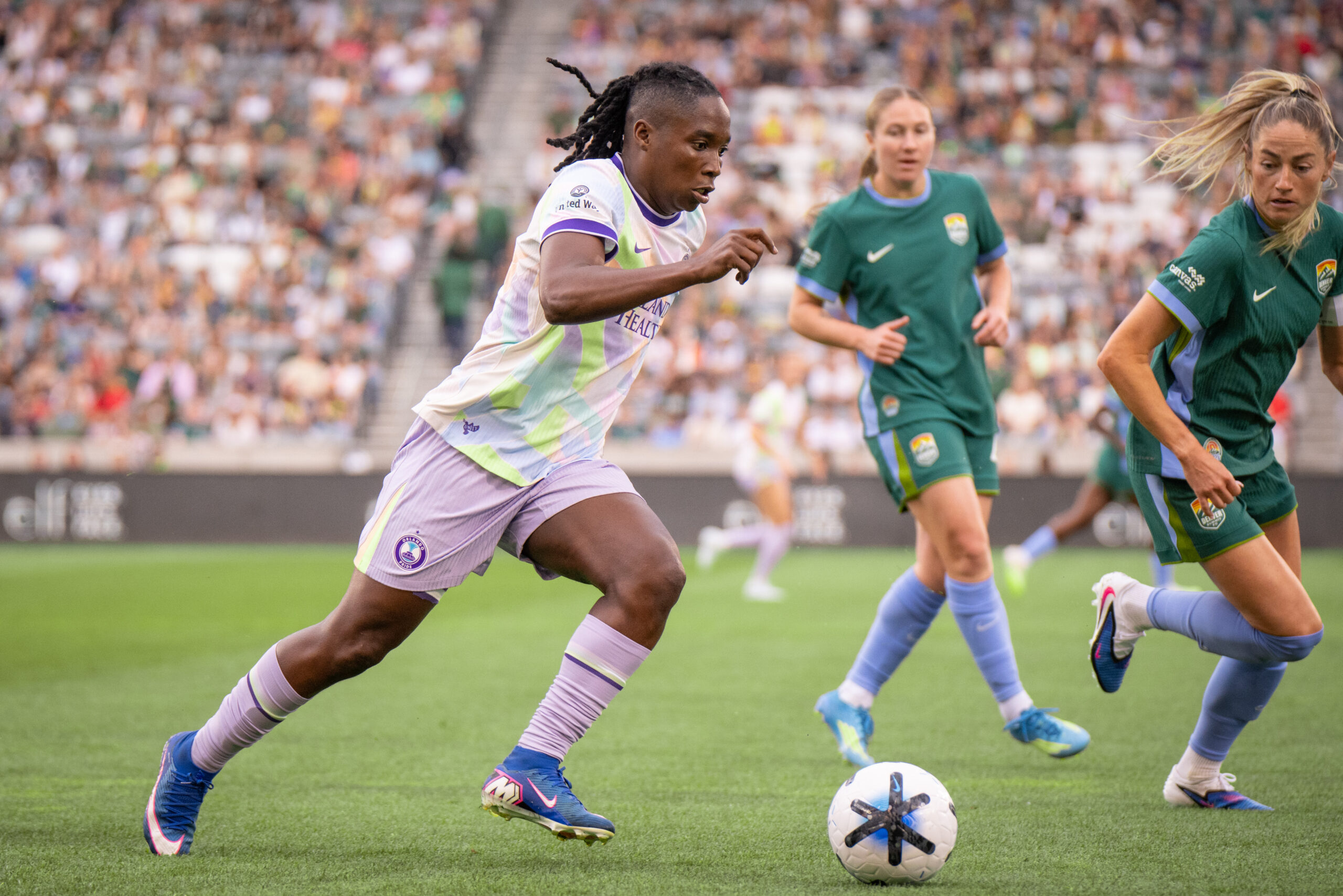 Image of Barbra Banda playing against Denver.