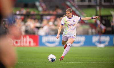 Image of Cori Dyke booting the ball up the field.