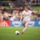 Image of Cori Dyke booting the ball up the field.