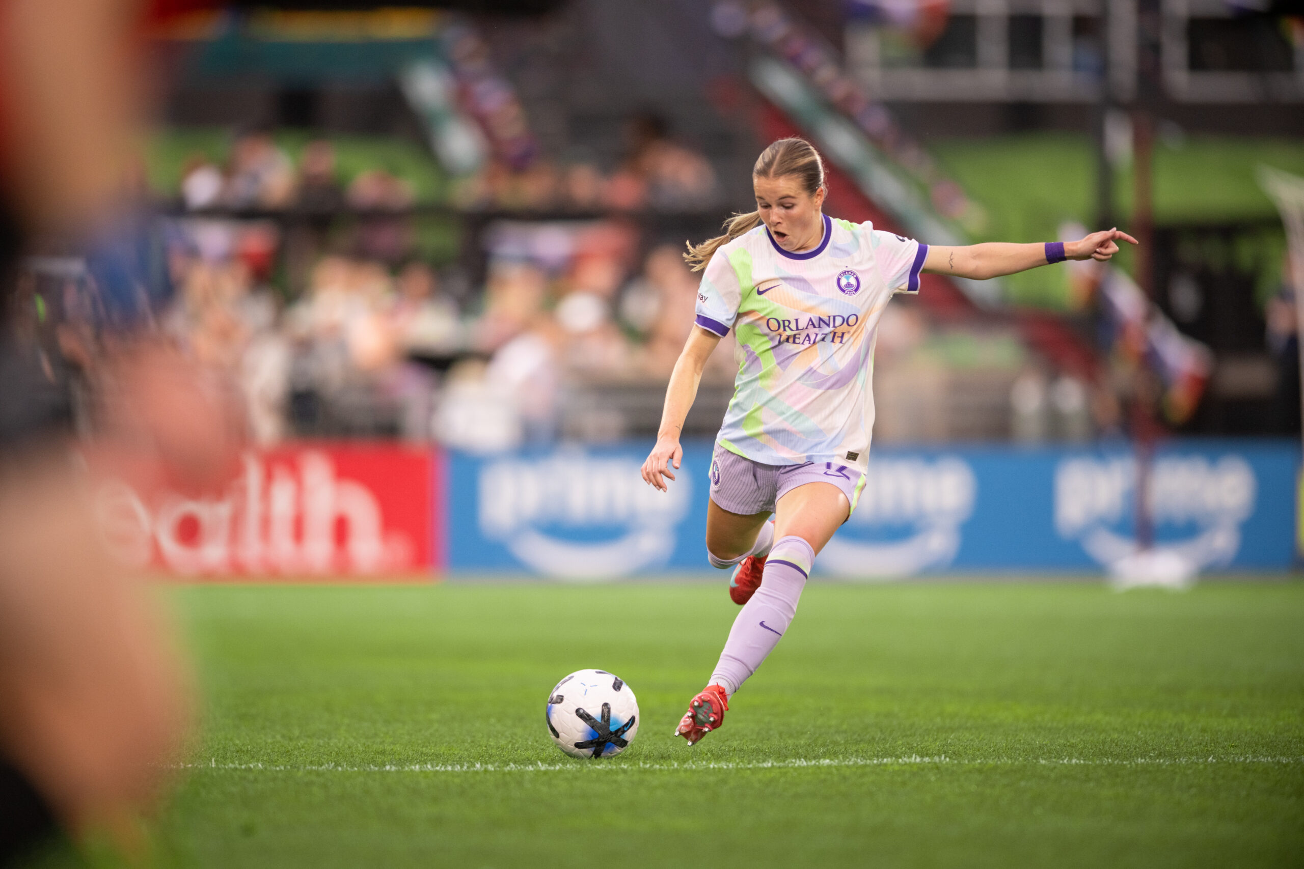 Image of Cori Dyke booting the ball up the field.