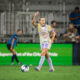 Image of Luana preparing to take a free kick.