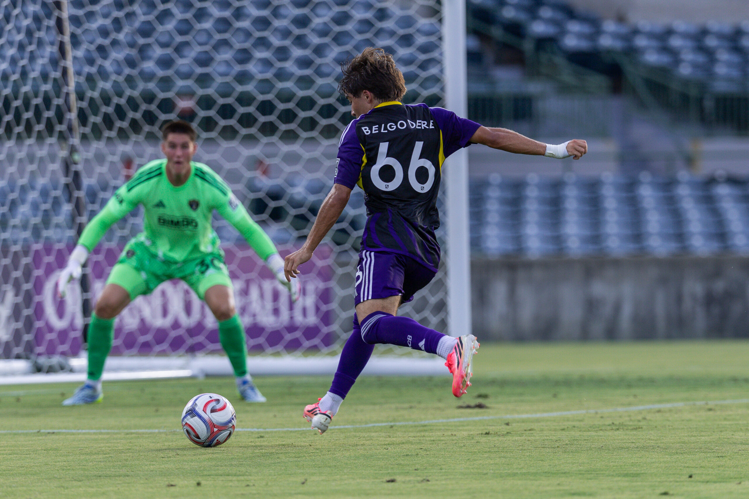 Image of Matthew Belgodere of OCB firing a shot against Philadelphia Union II.