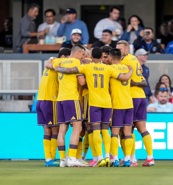 Image of Orlando City players celebrating a goal against San Jose.