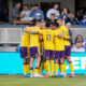 Image of Orlando City players celebrating a goal against San Jose.
