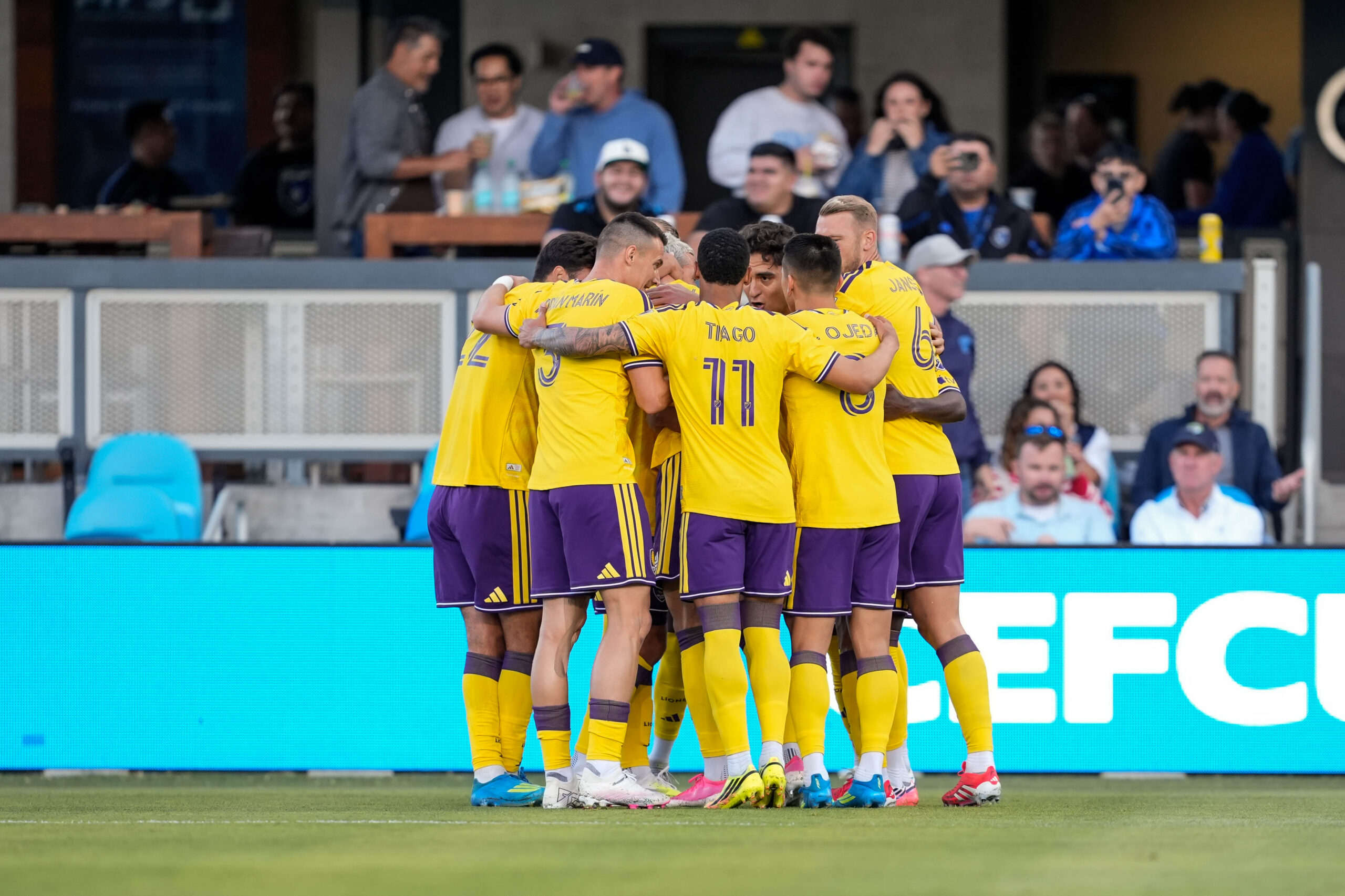 Image of Orlando City players celebrating a goal against San Jose.