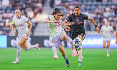 Image of Jacquie Ovalle dribbling the ball against Angel City.
