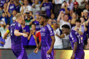 Image of Robin Jansson, Tyrese Spicer, and Ivan Angulo celebrating Spicer's goal against Nashville.