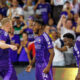 Image of Robin Jansson, Tyrese Spicer, and Ivan Angulo celebrating Spicer's goal against Nashville.