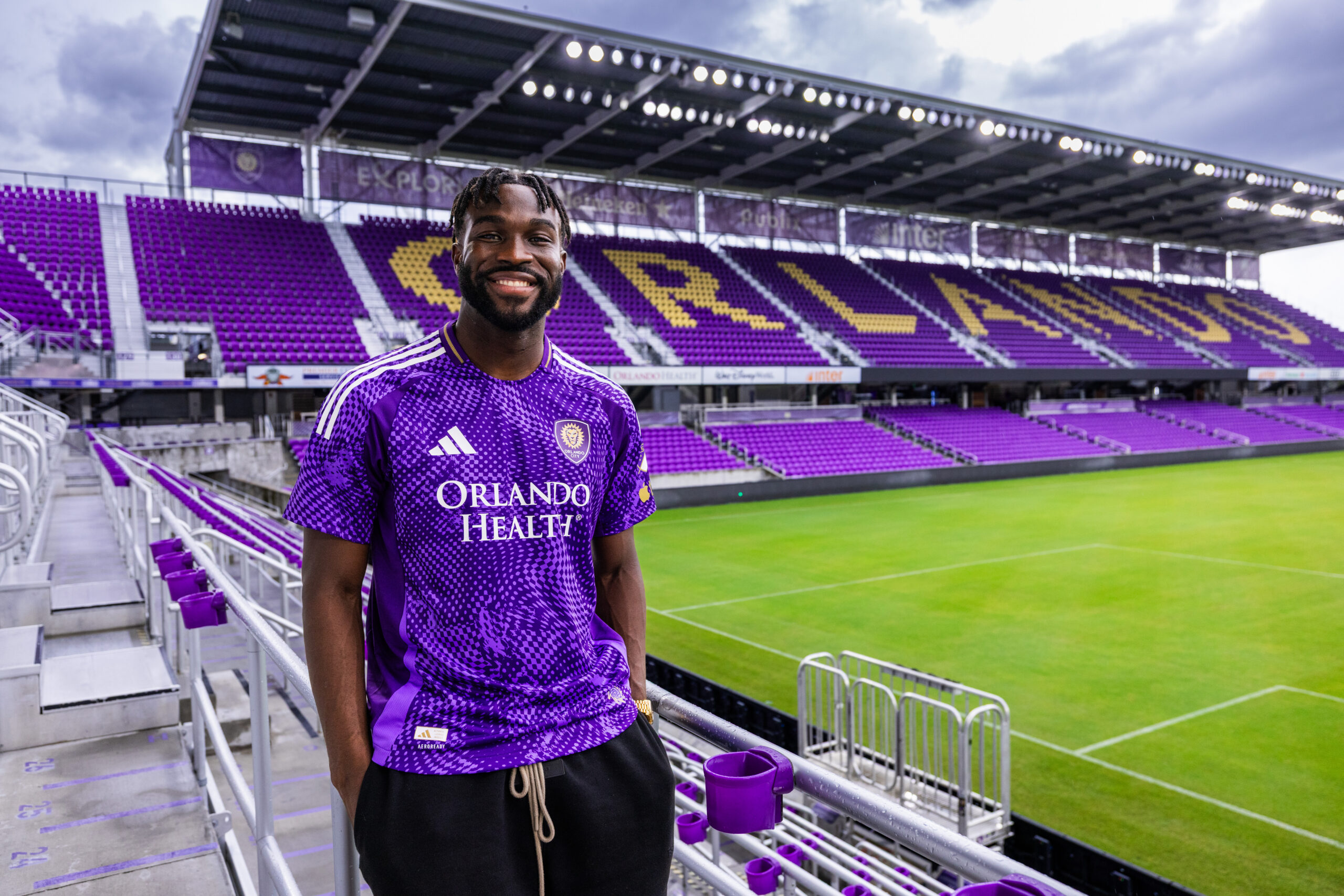 Image of Daryl Dike posing in his Orlando City kit after re-signing with the club on July 17, 2026.