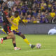 Image of Tyrese Spicer taking a shot against the New York Red Bulls.