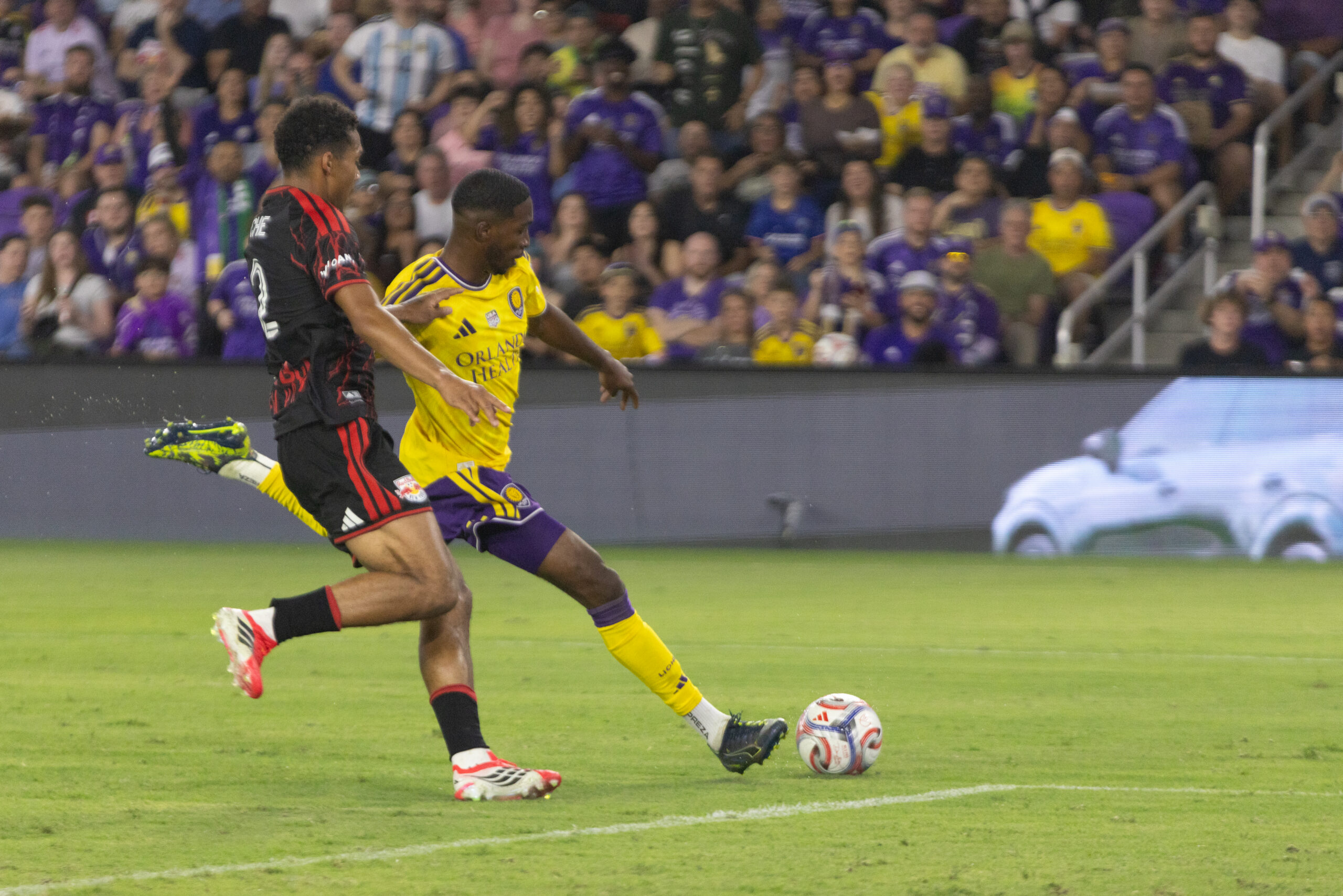 Image of Tyrese Spicer taking a shot against the New York Red Bulls.