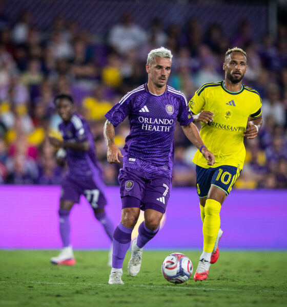 Image of Antoine Griezmann dribbling the ball past Hany Mukhtar of Nashville.