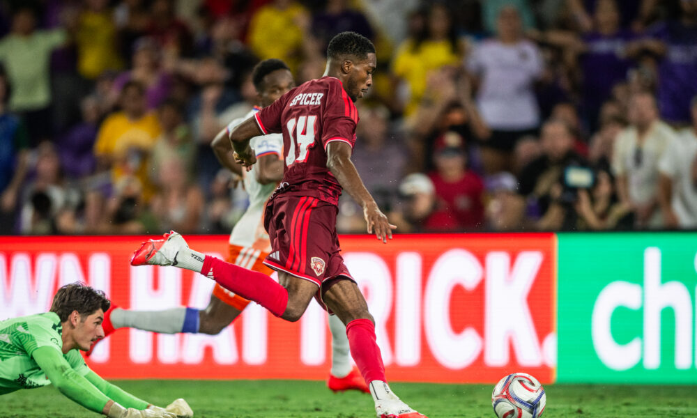 Image of Tyrese Spicer rounding the goalkeeper against Cincinnati.