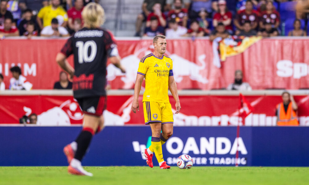 Image of Robin Jansson looking for passing options against the New York Red Bulls.