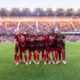 Image of Orlando City's starters pose for a pregame photo wearing their Archive Collection third kits.