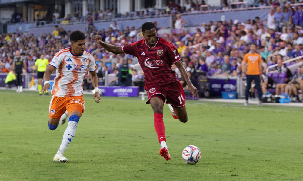 Image of Tyrese Spicer battling against FC Cincinnati.