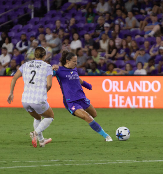 Image of Kerry Abello taking a shot against Louisville.
