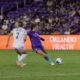 Image of Kerry Abello taking a shot against Louisville.