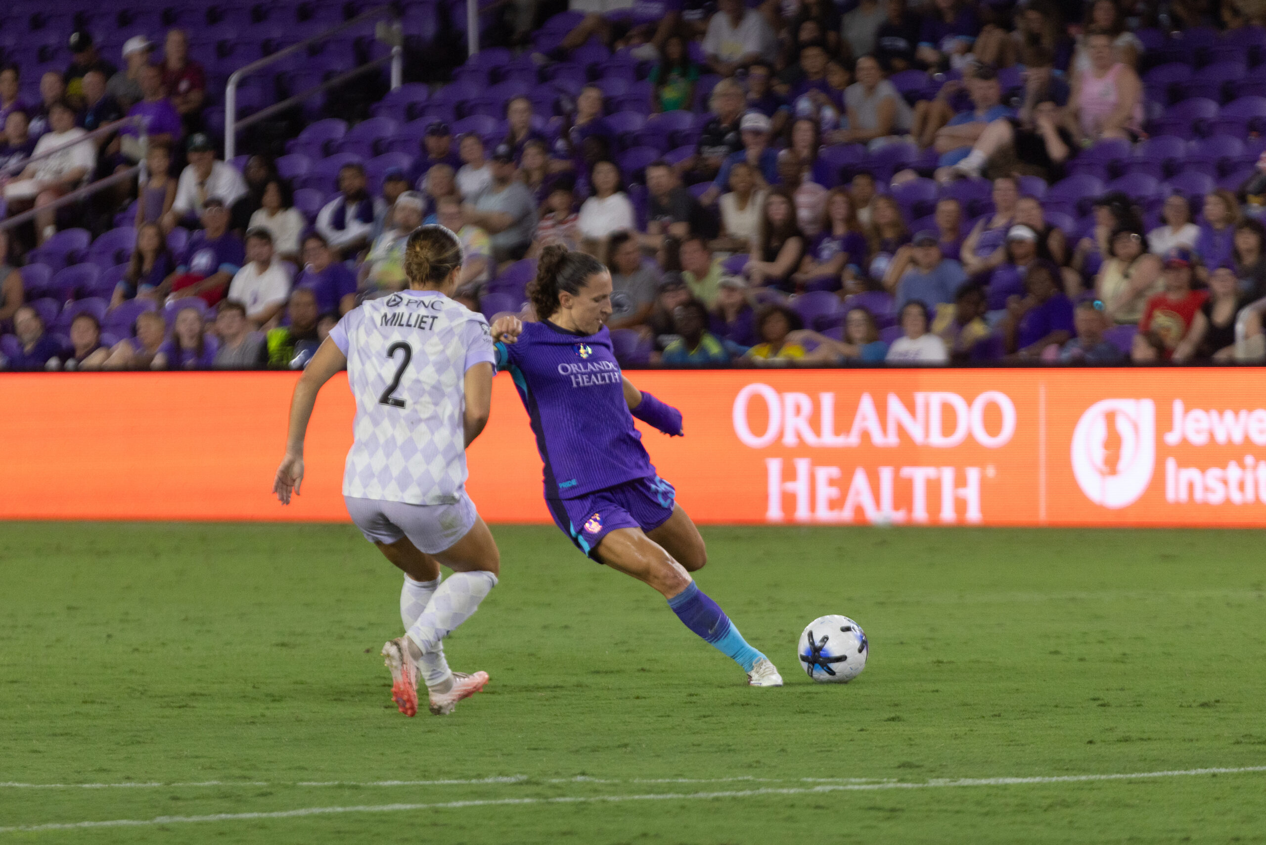 Image of Kerry Abello taking a shot against Louisville.