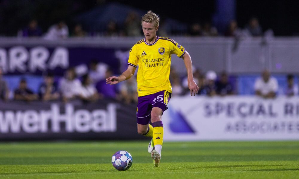 Image of Colin Guske playing the ball through the midfield.