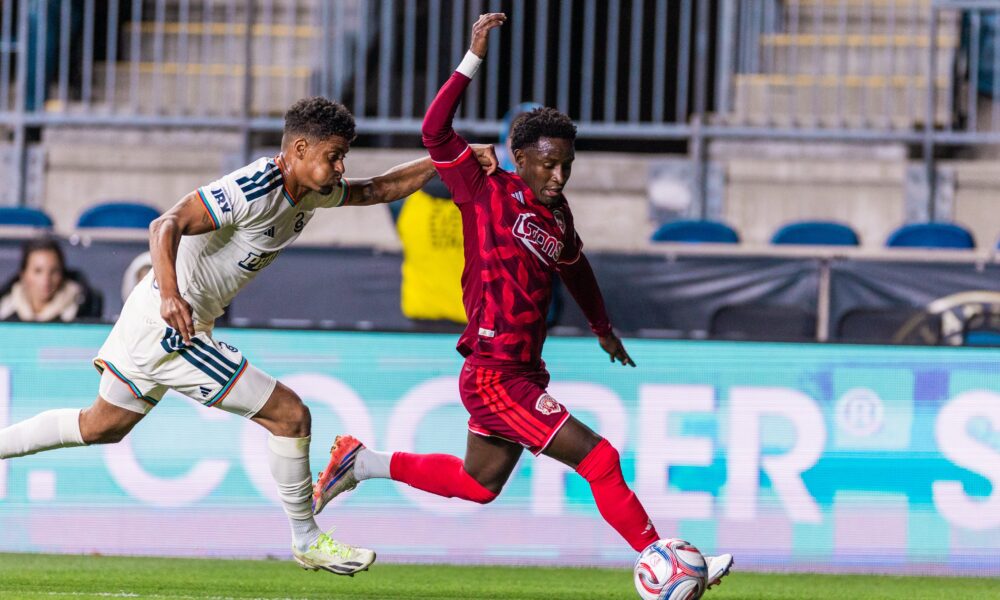 Image of Ivan Angulo dribbling down the left against Philadelphia.