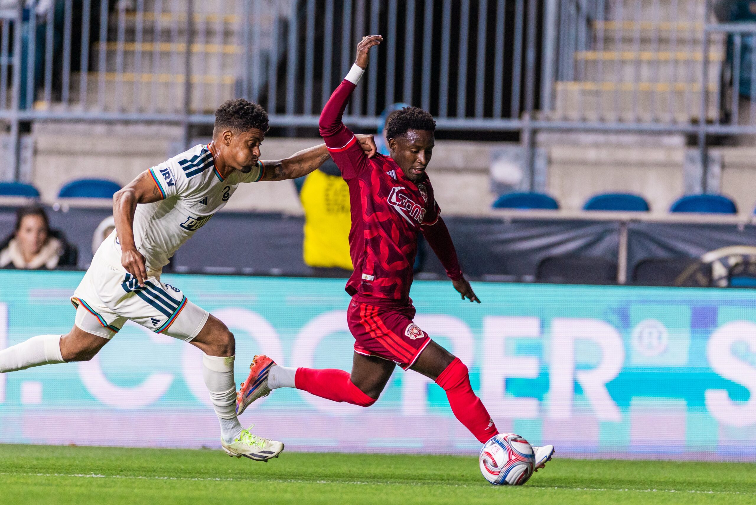 Image of Ivan Angulo dribbling down the left against Philadelphia.