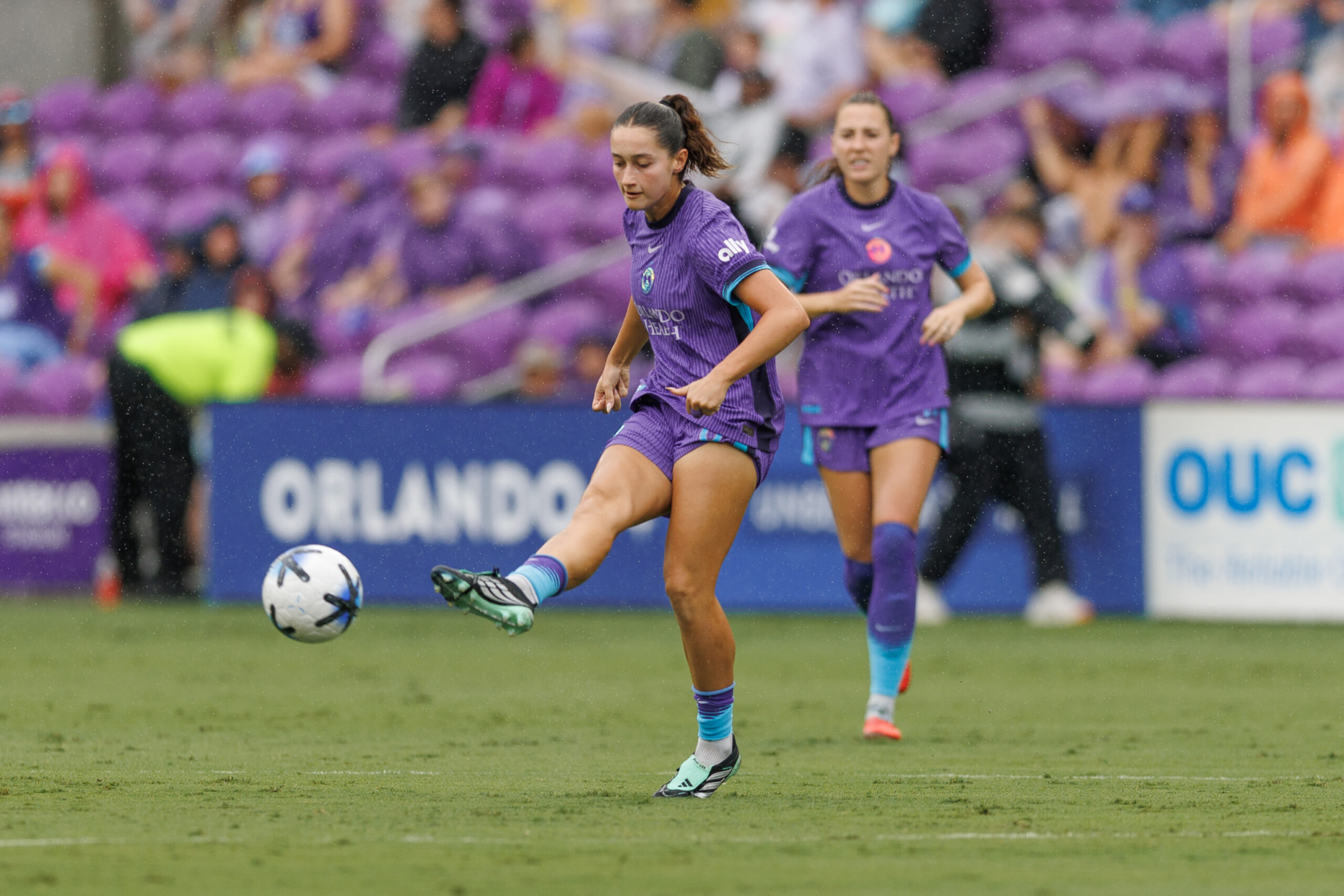 Image of Ally Lemos sending a pass forward.