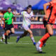 Image of Jacquie Ovalle dribbling toward the Bay FC defense.