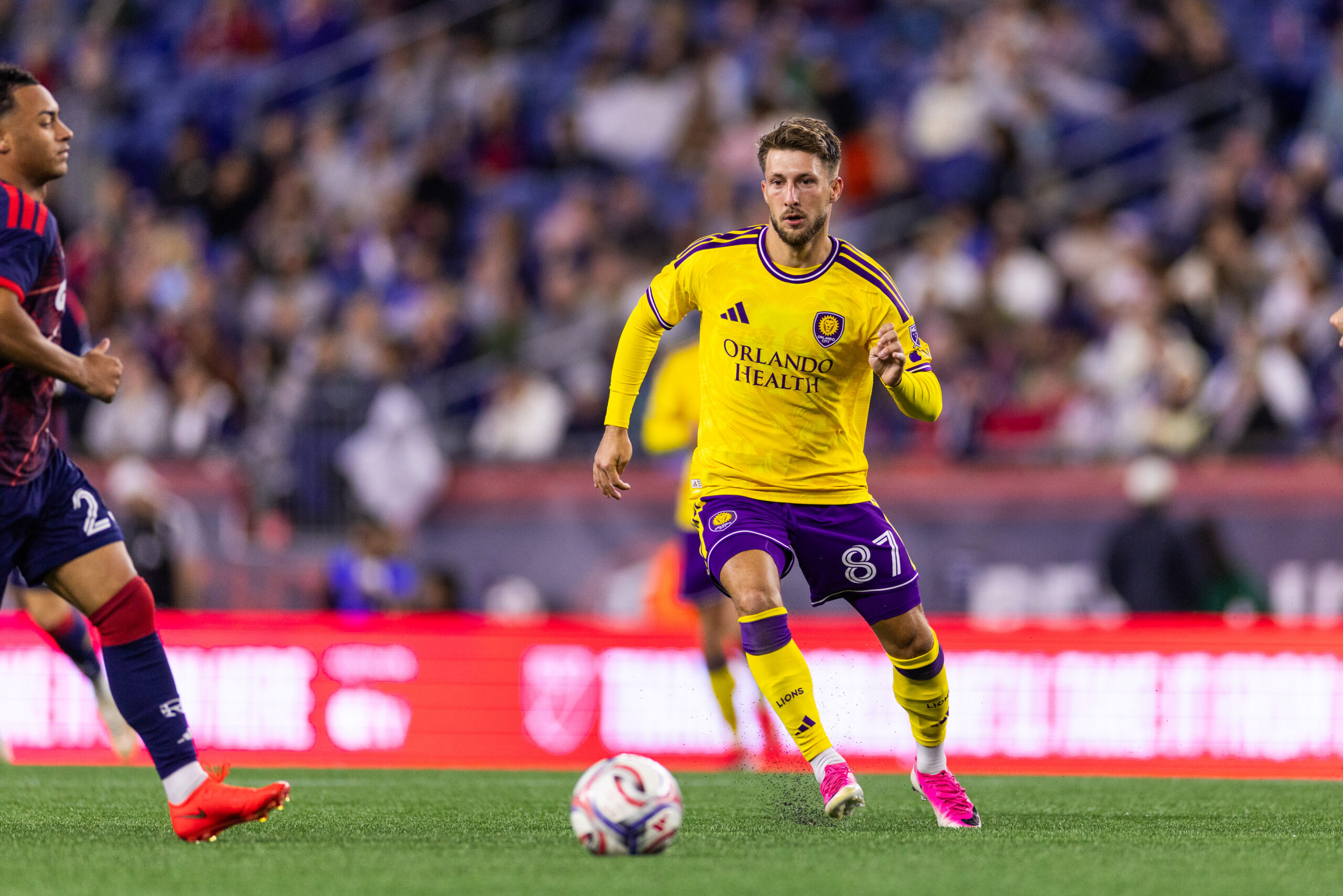 Image of Marco Pasalic on the ball against New England.