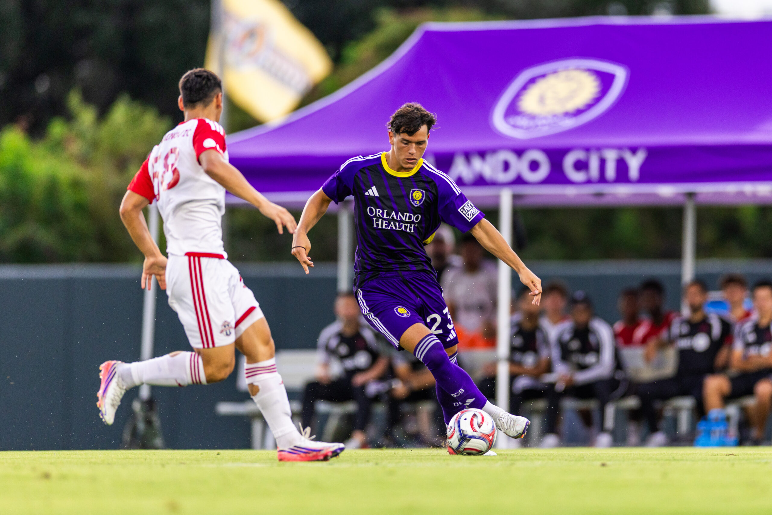 Image of Harvey Sarajian working past a Toronto FC II defender.